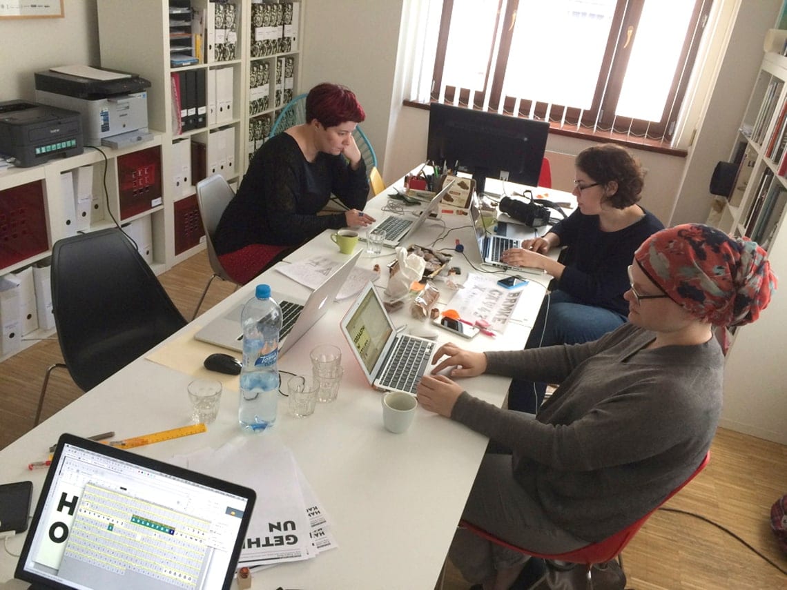Irene Vlachou, Elena Veguillas, and prior teammate Sonja Stange working on production for the Ahoj typeface, 